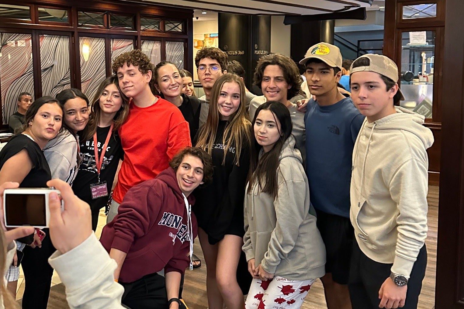 Group of BLI students together in the lobby of the evo residence in Montréal