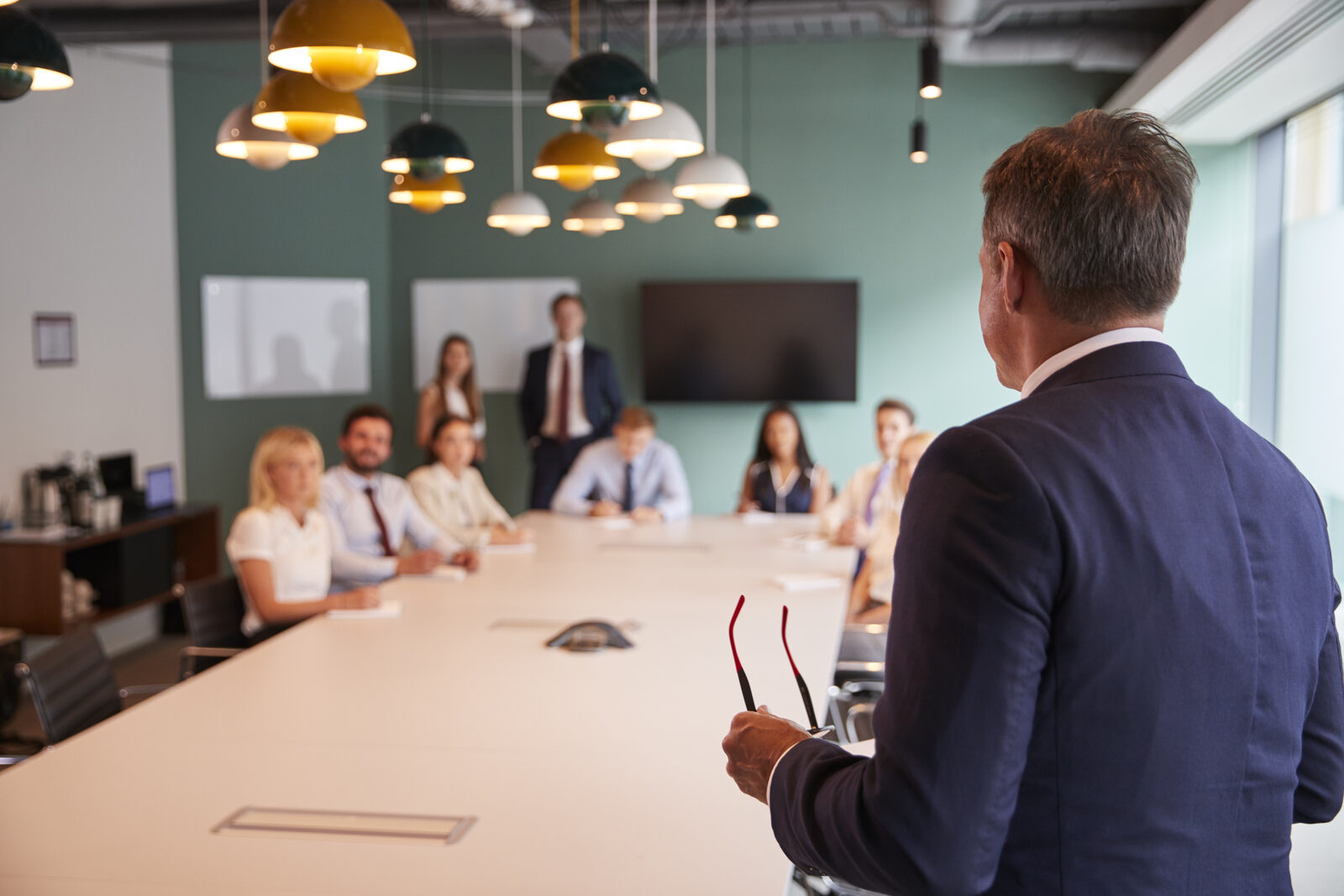 Executive presenting in a meeting