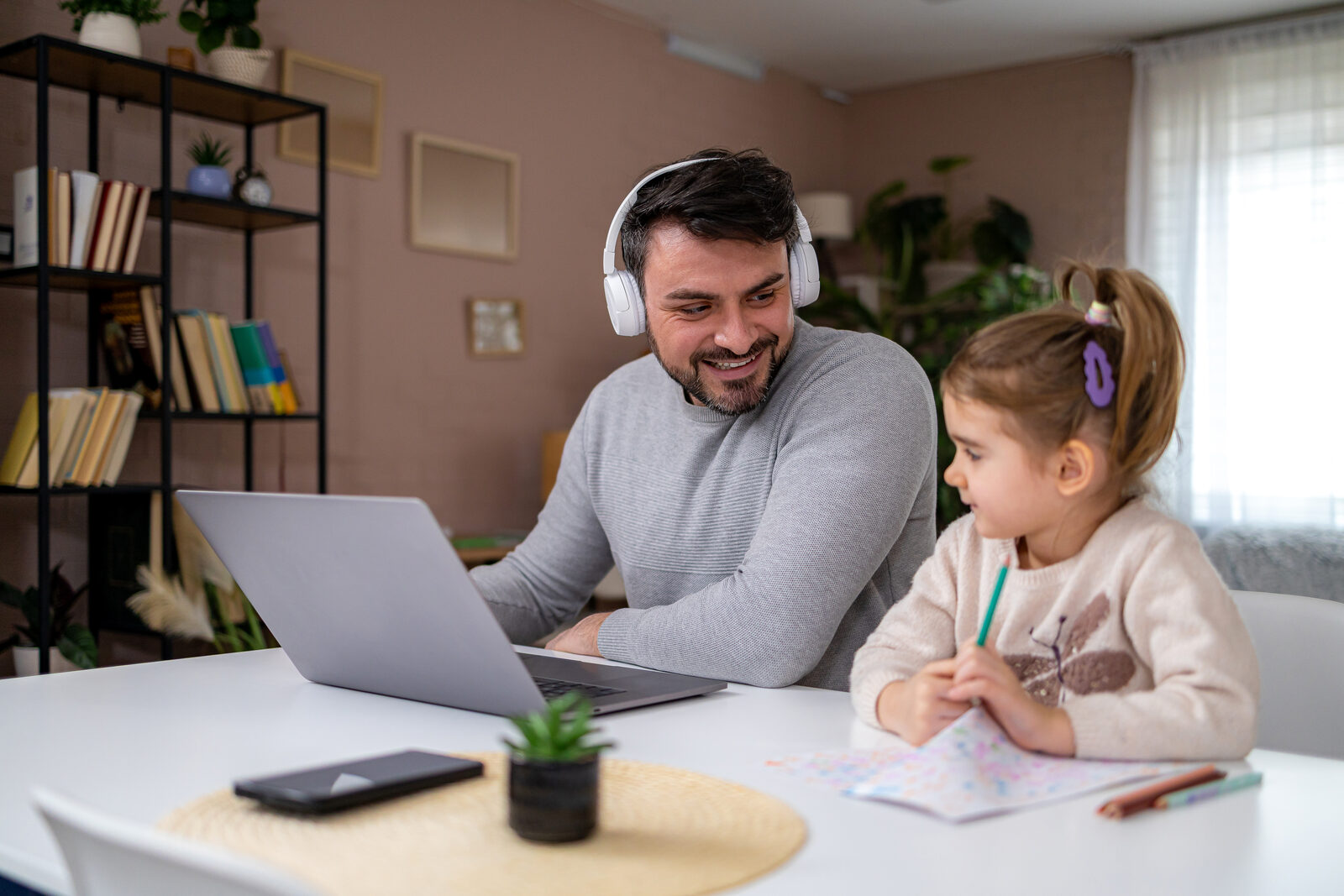Parent taking an online English class at home