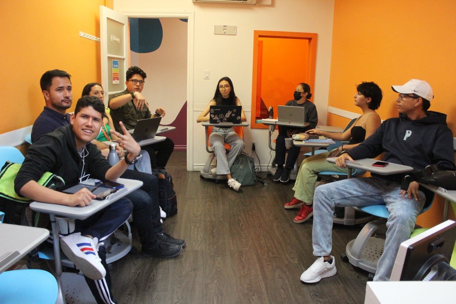 Campers working together at their desks during a workshop at BLI