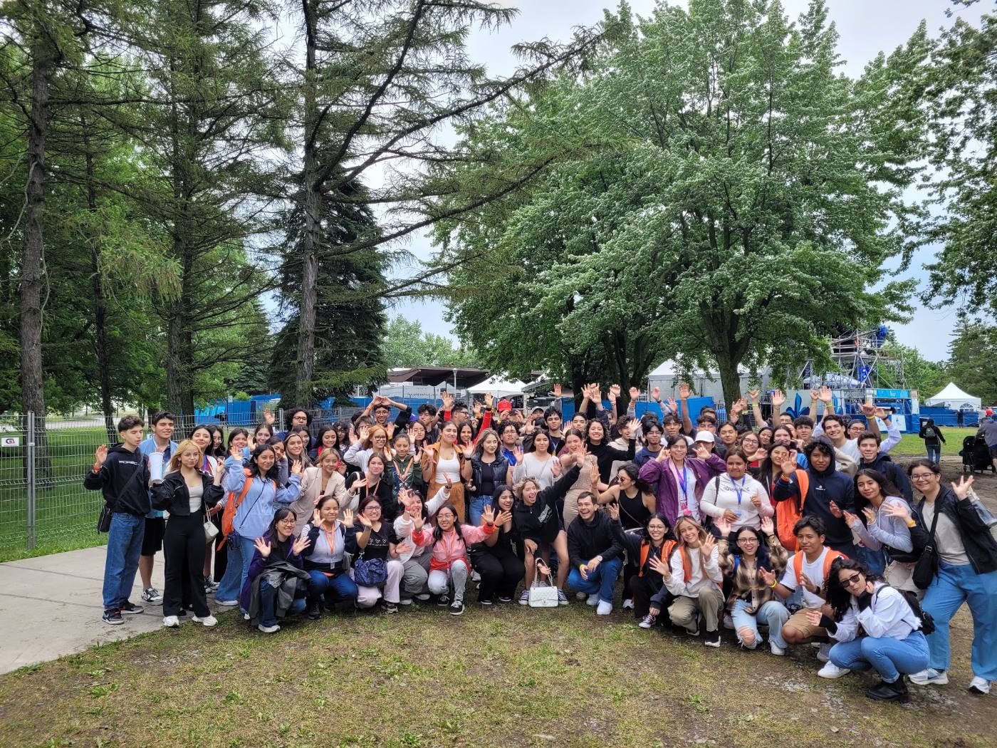 Students celebrating in a park in summer