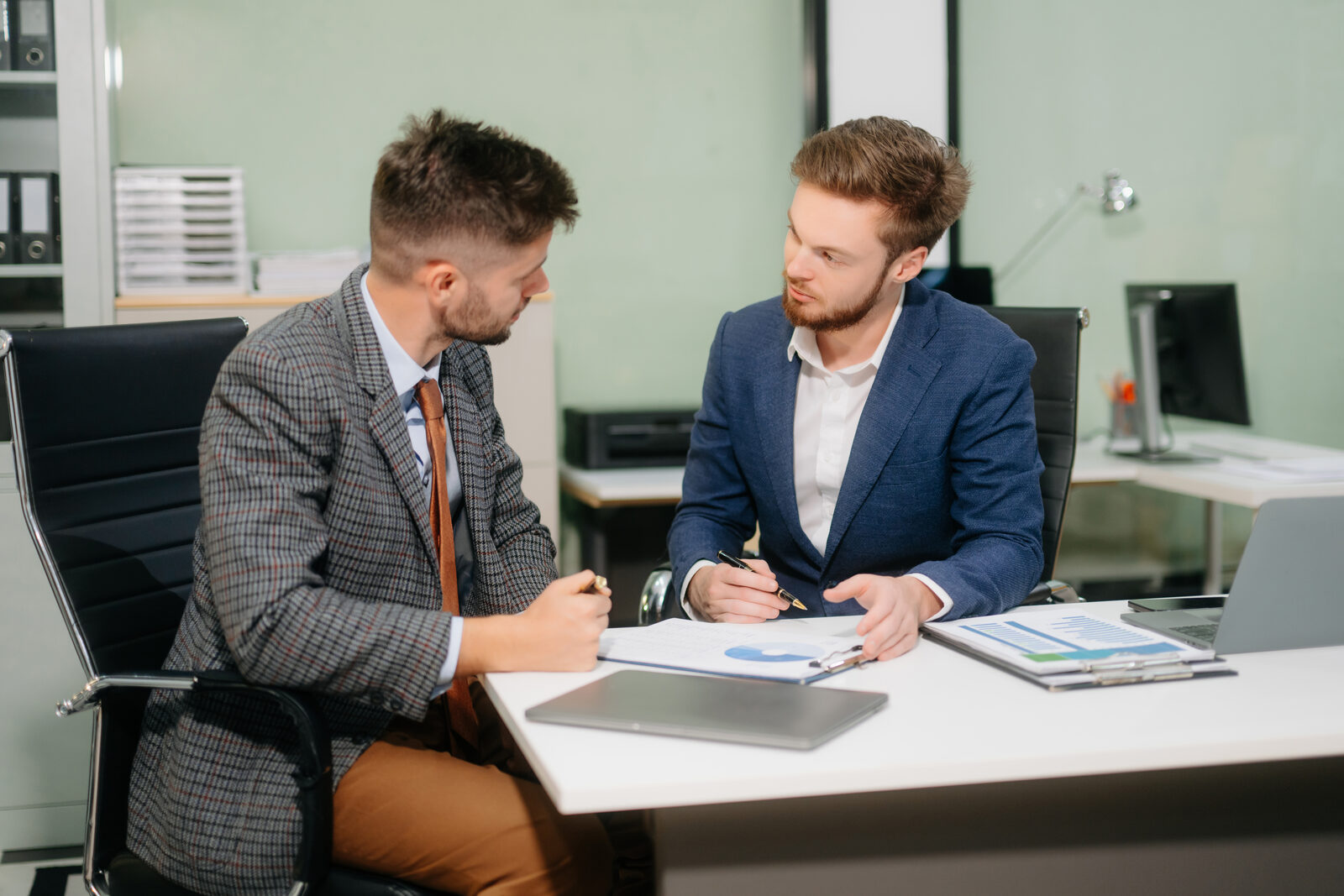 Teacher and executive in a one-on-one session